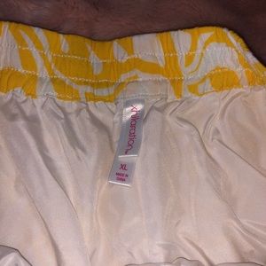 White and yellow fashion shorts.
